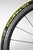 Schwalbe Ultremo ZX foldable road clincher tyre black with yellow stripe on rim