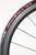 Schwalbe Ultremo ZX foldable road clincher tyre black with red stripe on rim